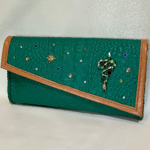 Embellished green croc print leather bag with tan trim