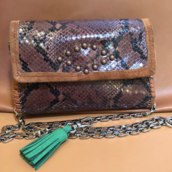 Brown snake print leather mini bag with chain strap and tassel clip on.