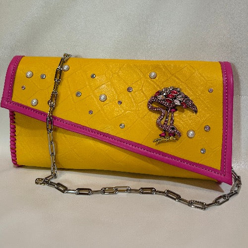 Yellow croc print leather bejeweled clutch bag with chain handle.