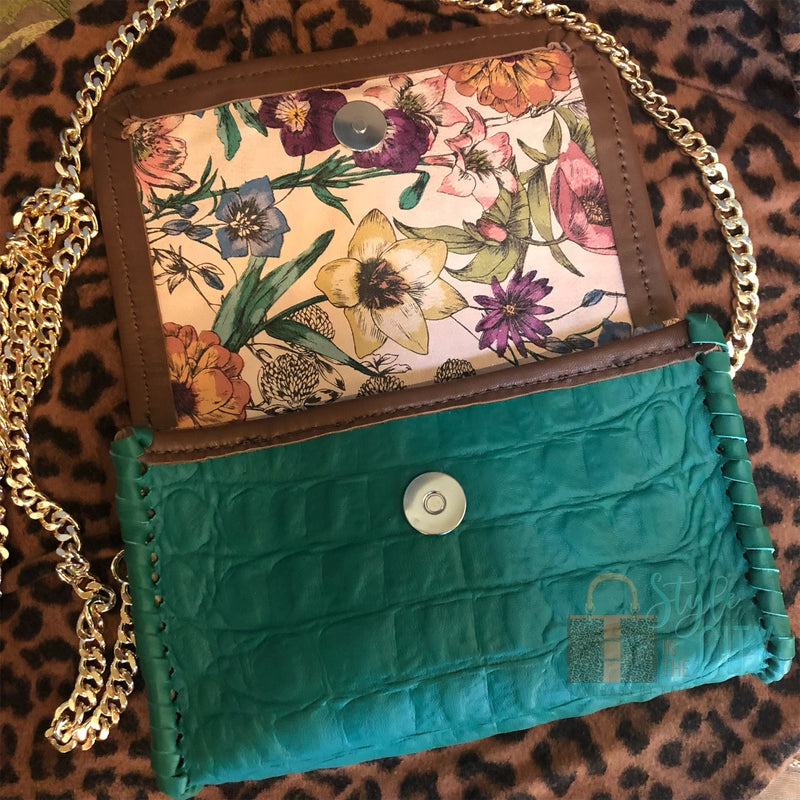 Beautiful floral printed leather lining of Green Croc Leather mini bag. 