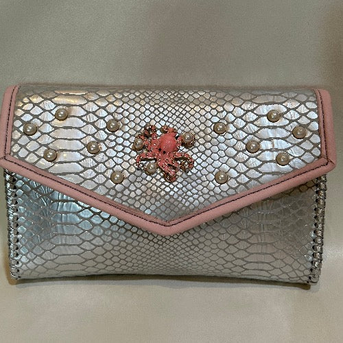 Silver snake print leather with pink trim and pearl accents. 