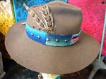 vintage hat-western grunge hat,vintage brown wool hat,restyled felt hat,vintage felt hat,restyled serape and felt hat,vintage wide brim hat,vintage flat brim felt hat with serape hatband,hat with vintage serape hatband,cowgirl hat,vintage cowgirl hat,vintage boho hat,boho style felt hat,indiana jones style hat,gypsy cowgirl style hat,mod vintage couture hat,santa fe style hat,western chic hat,ladies vintage cowgirl hat 