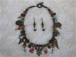 necklace set-relic necklace,religious necklace,St Francis,charm necklace,cross necklace,metal bead necklace,gypsy necklace,cowgirl necklace,boho necklace,bohemian necklace,altered art necklace,religious art necklace,Dia de los Muertos necklace, day of the dead necklace, religious artifact necklace,saints necklace,