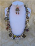 necklace set-relic necklace,religious necklace,charm necklace,guadalupe necklace,saints necklace,cross necklace,milagro necklace,little miracles necklace,little miracles of san miguel necklace set,gypsy necklace,bohemian necklace,altered art necklace, altered religious art necklace, junk gypsy style necklace, vintage style necklace, beaded charm necklace,relic jewelry,religious relic jewelry